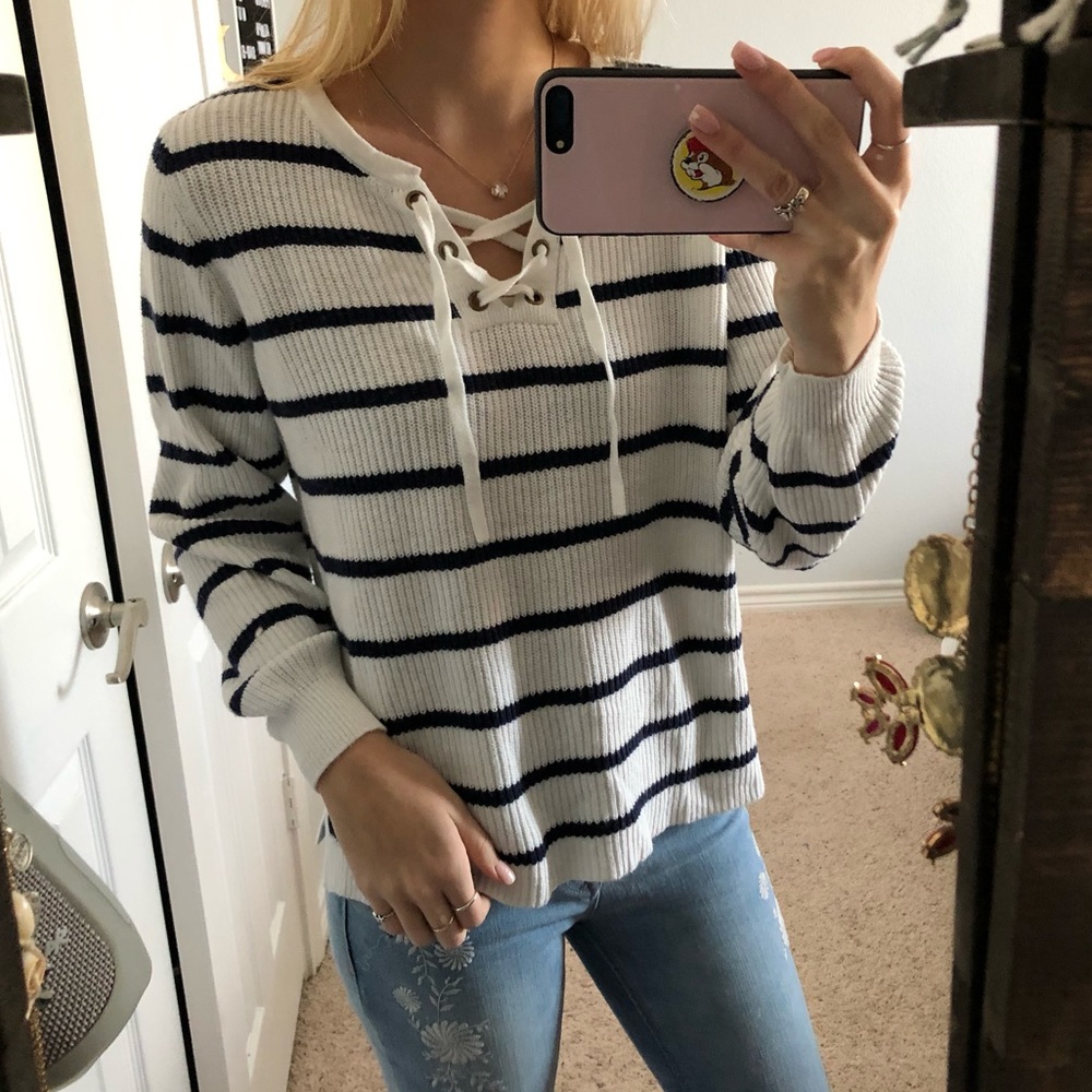 White and navy sweater